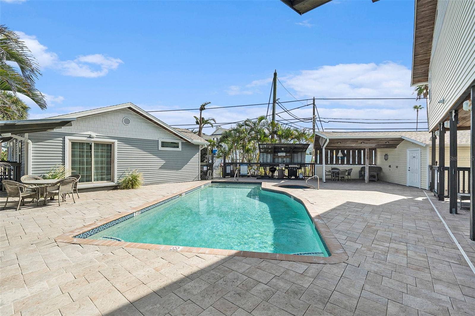 8425 W GULF BOULEVARD, Treasure Island, FL 33706 pool deck, grill area