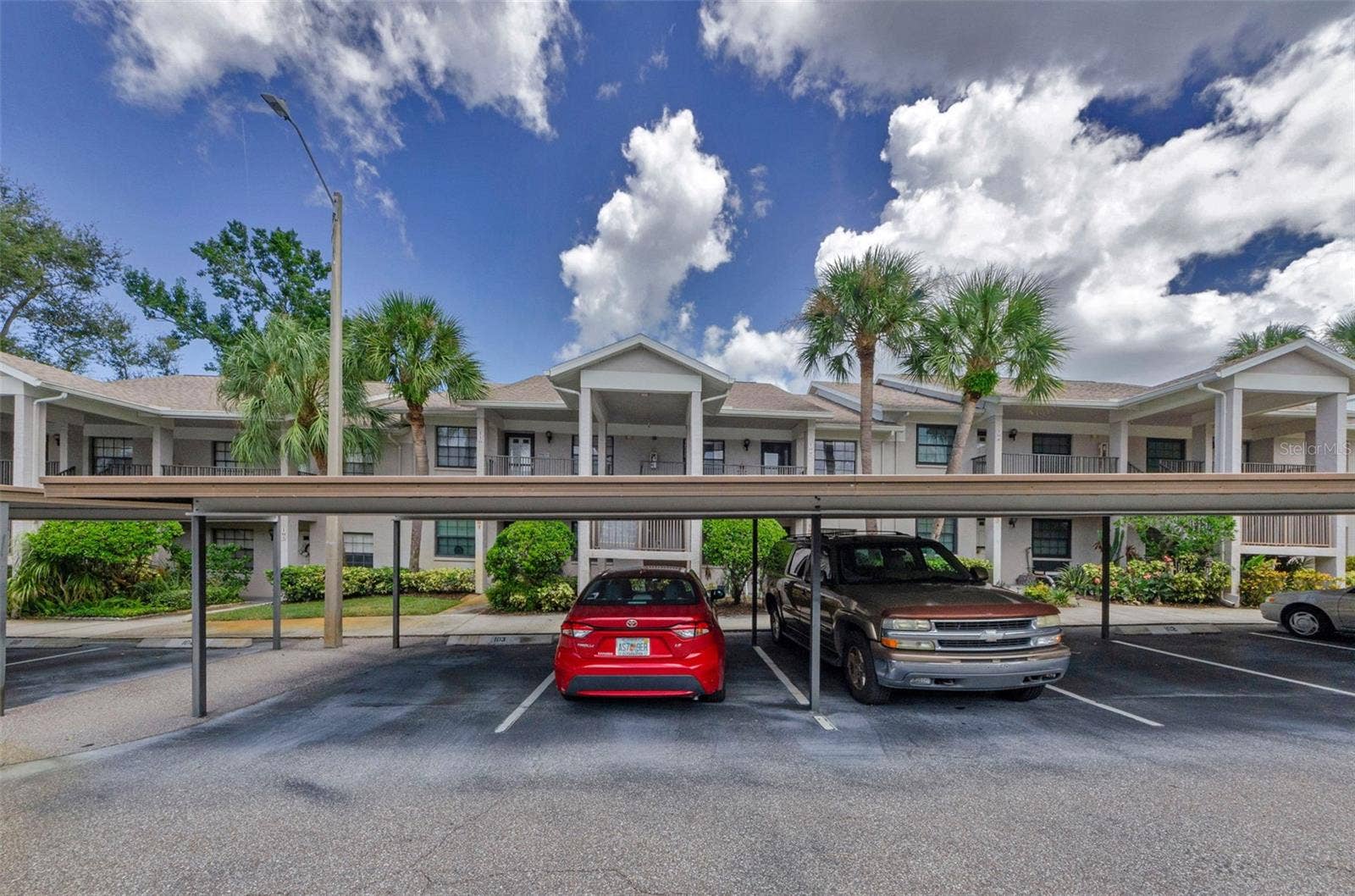 2119 ELM STREET, #103, Dunedin, FL 34698 covered parking at front of unit