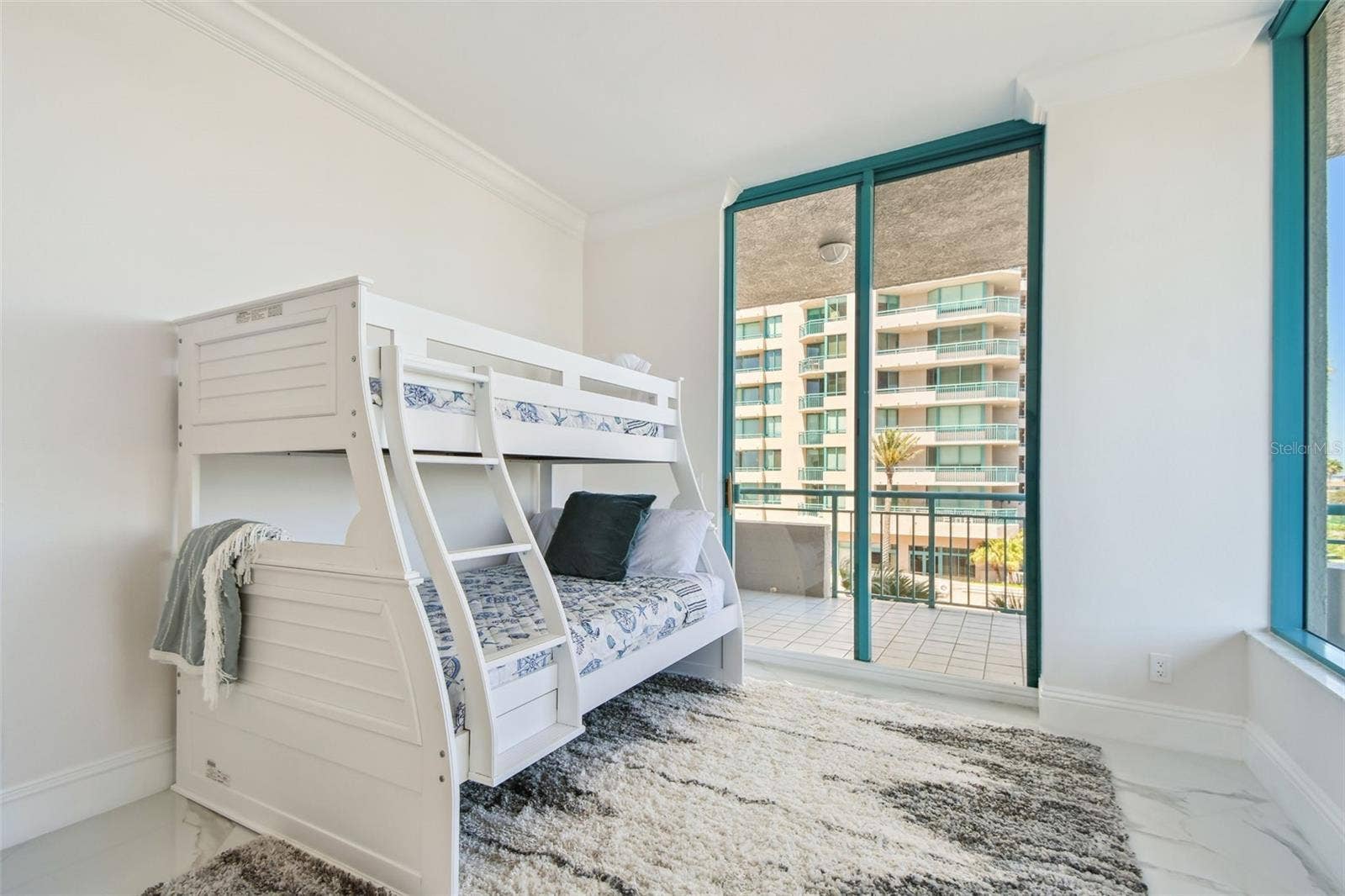 1560 GULF BOULEVARD, #306, Clearwater Beach, FL 33767 Fourth bedroom with pool & intracoastal views