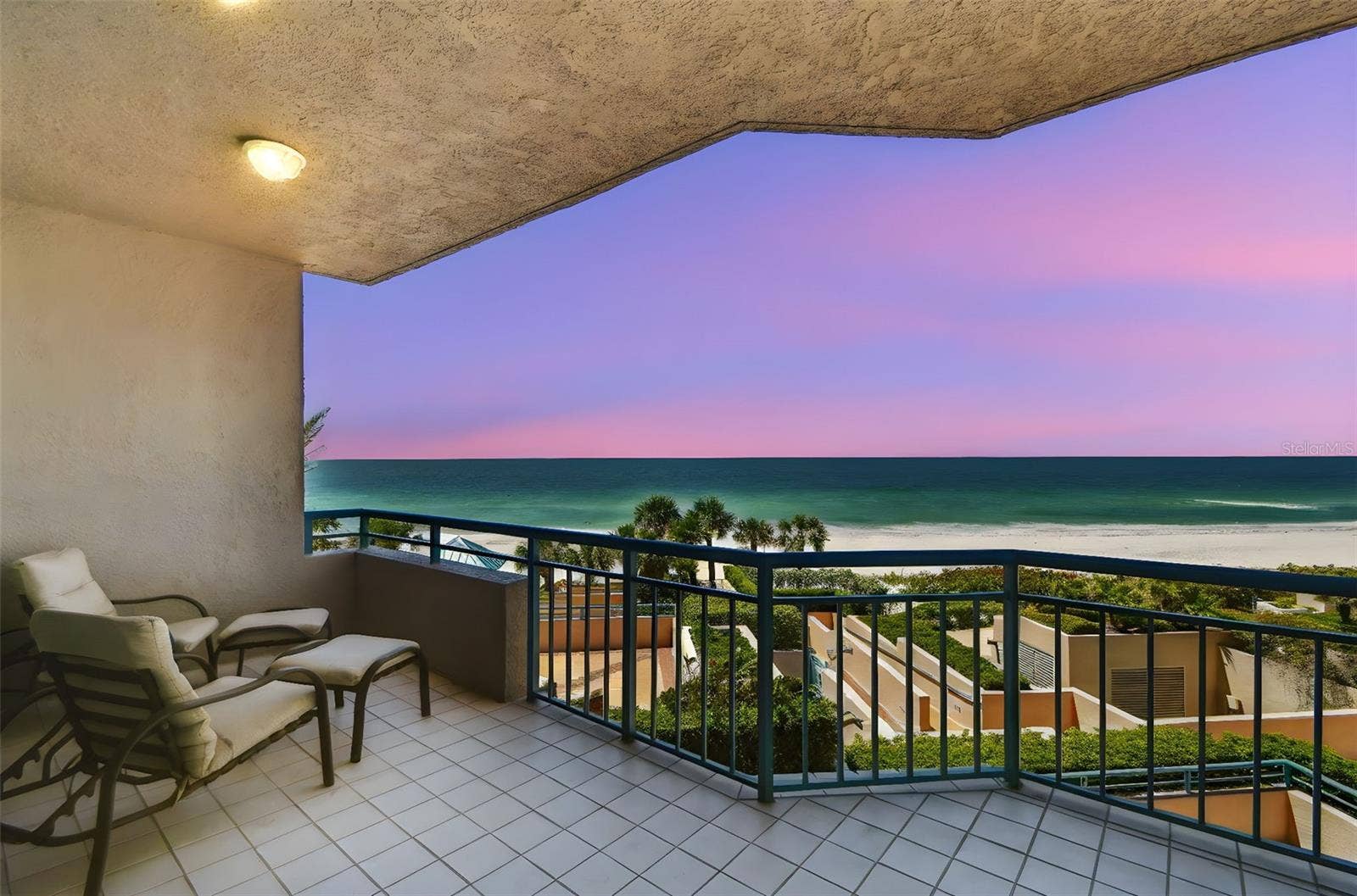 1560 GULF BOULEVARD, #306, Clearwater Beach, FL 33767 Primary Bedroom balcony overlooking Gulf-Dusk