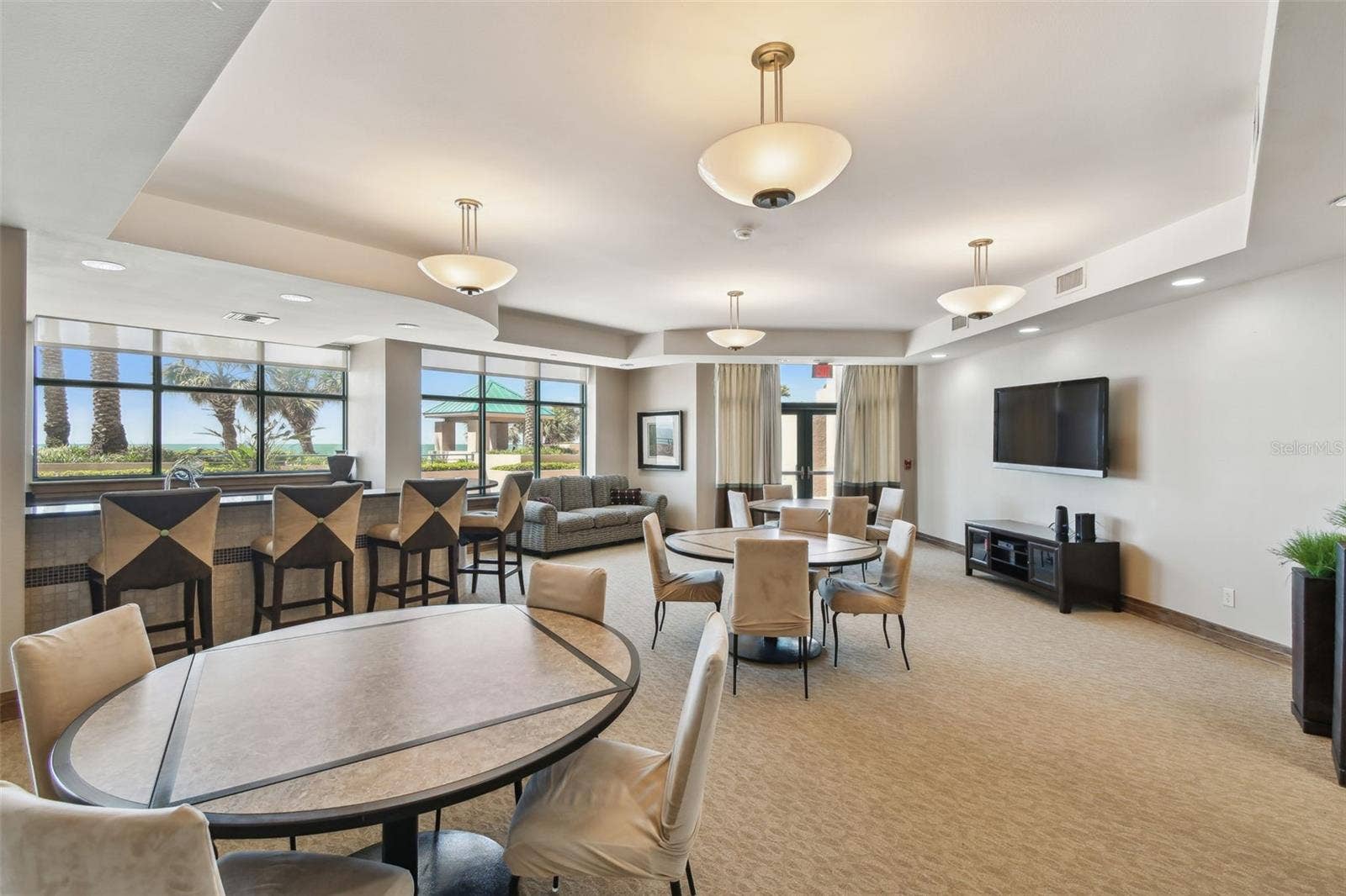1560 GULF BOULEVARD, #306, Clearwater Beach, FL 33767 Community Room with hightop bar & kitchen