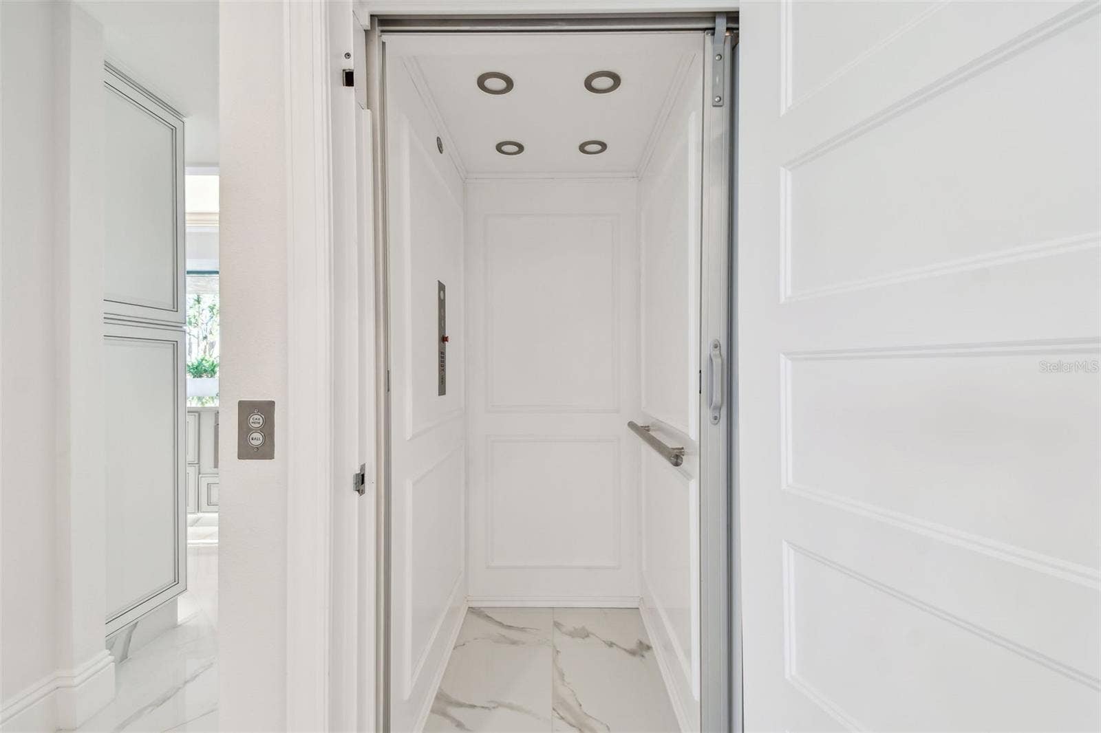 1560 GULF BOULEVARD, #306, Clearwater Beach, FL 33767 Elevator entrance in foyer
