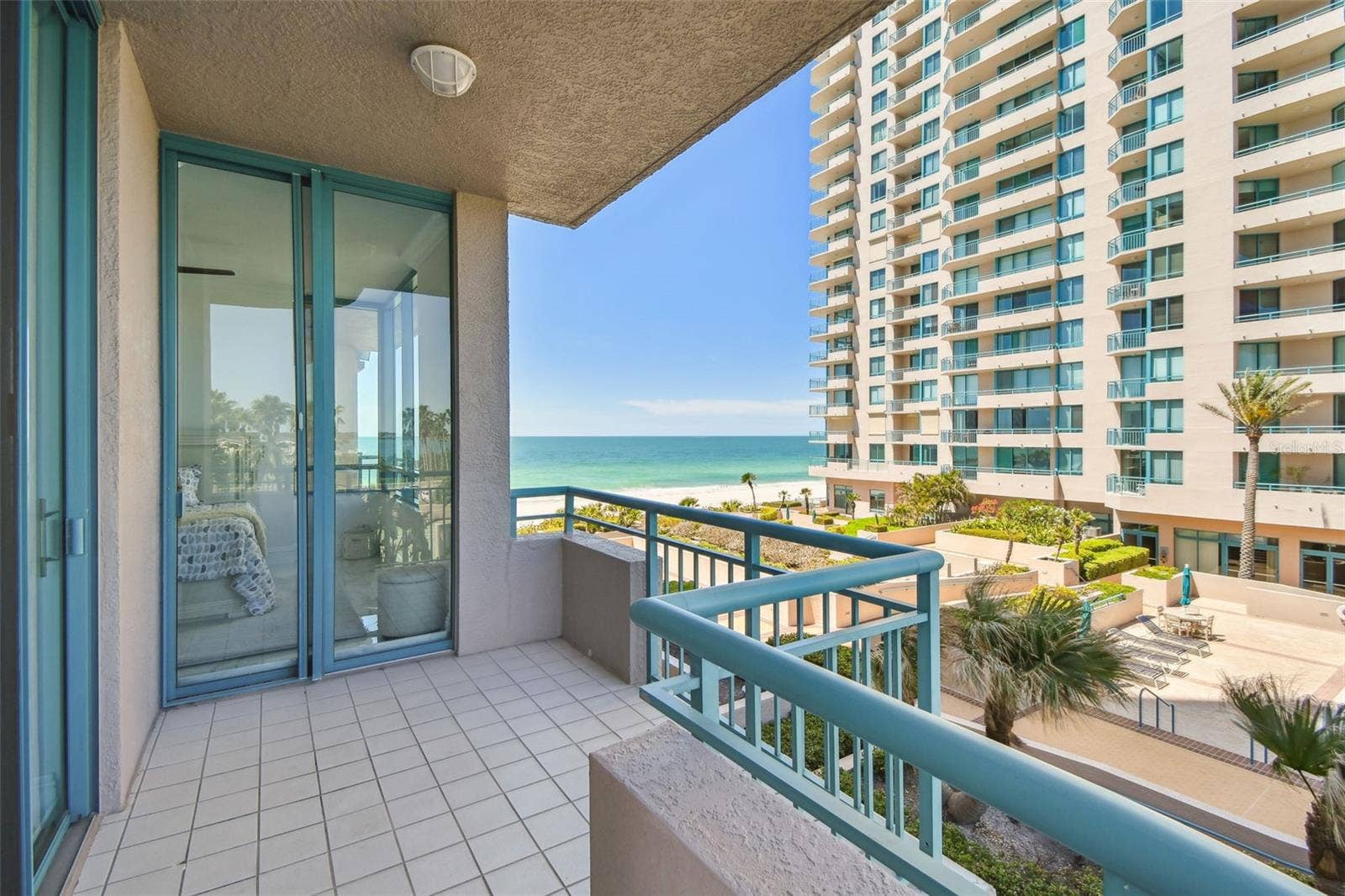 1560 GULF BOULEVARD, #306, Clearwater Beach, FL 33767 Second & Fourth Bedroom balcony overlooking patio & pool. Great Gulf views