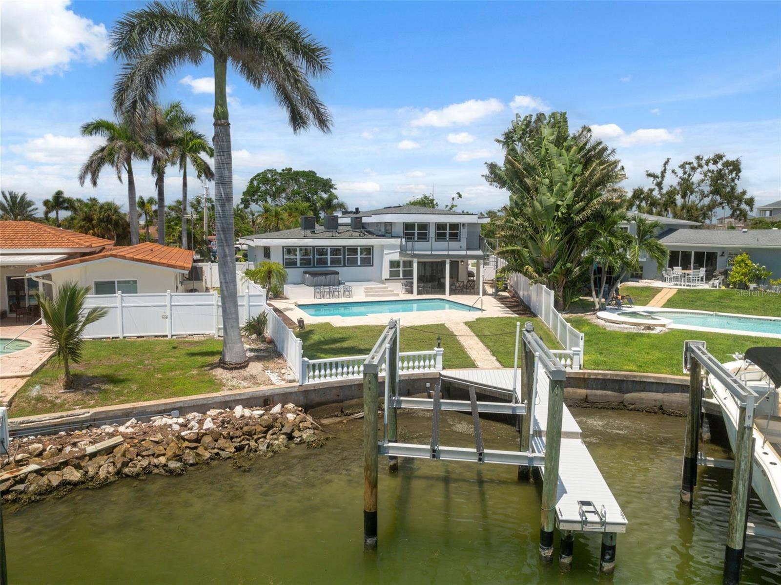 900 79TH STREET S, St Petersburg, FL 33707 Boat lift & dock on the intracoastal, pool, views- this one has it all!
