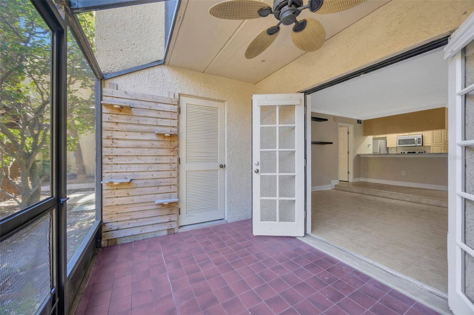 5305 SAN SEBASTIAN COURT, #127, Tampa, FL 33609 View of french doors and llaundry room
