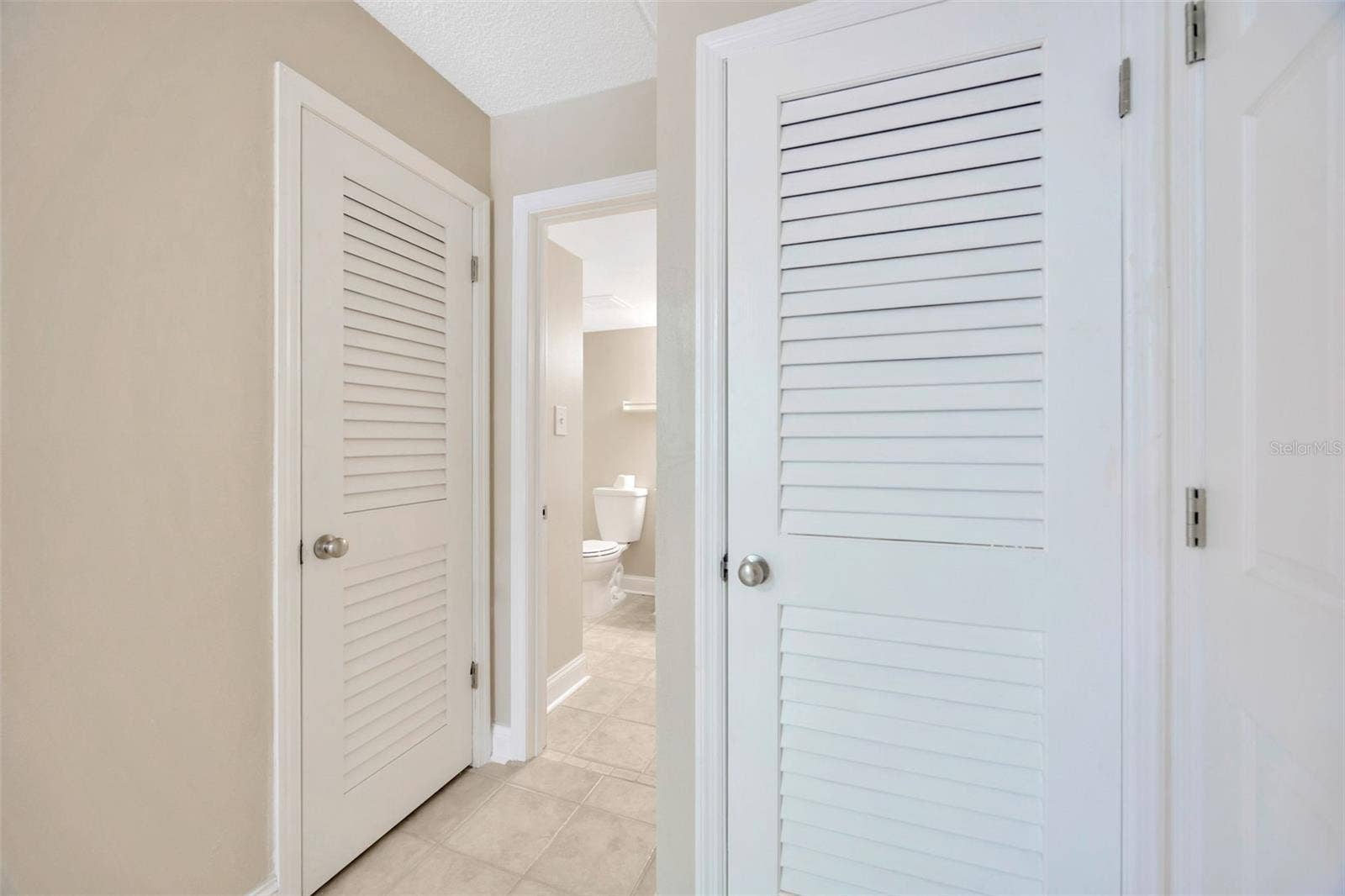 5305 SAN SEBASTIAN COURT, #127, Tampa, FL 33609 Walk in and linen closet