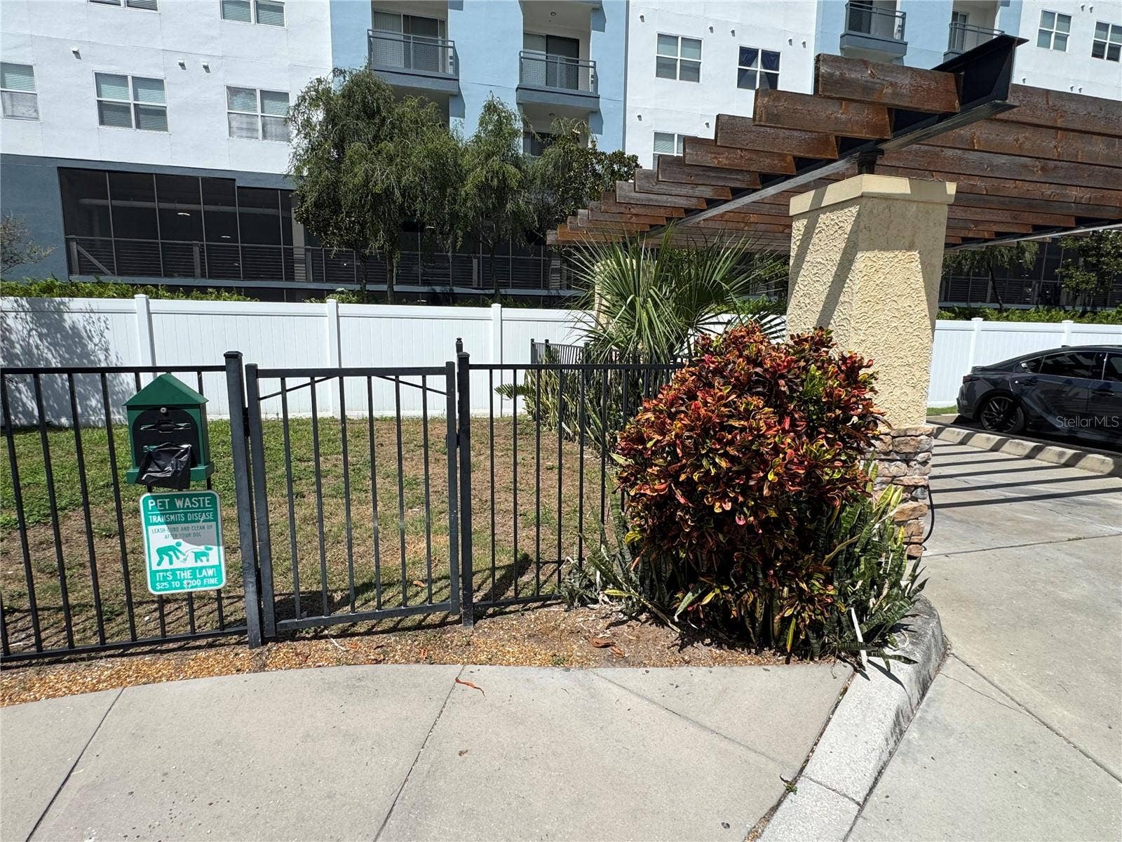 5305 SAN SEBASTIAN COURT, #127, Tampa, FL 33609 Dog Park next to car wash