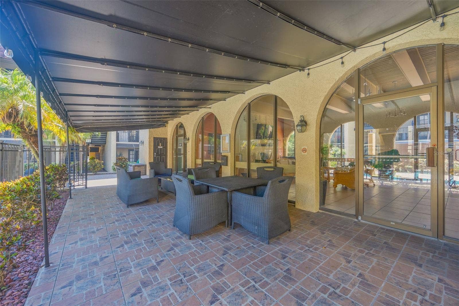 5305 SAN SEBASTIAN COURT, #127, Tampa, FL 33609 Shaded deck at clubhouse
