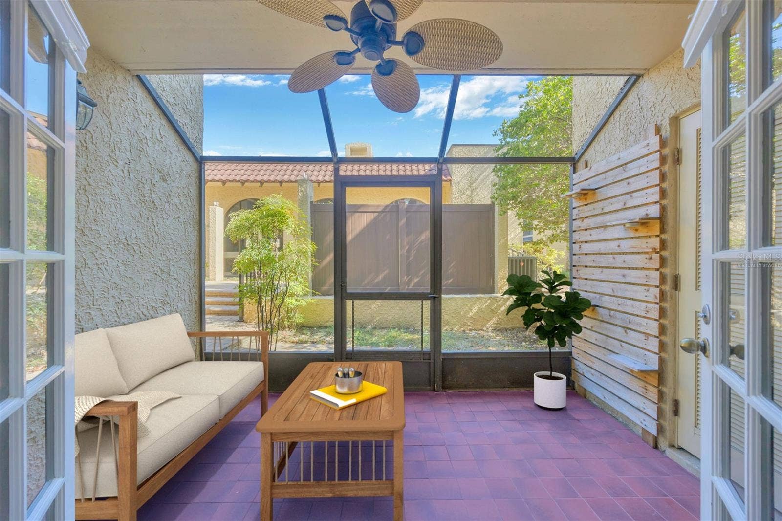 5305 SAN SEBASTIAN COURT, #127, Tampa, FL 33609 Lanai Virtually Staged