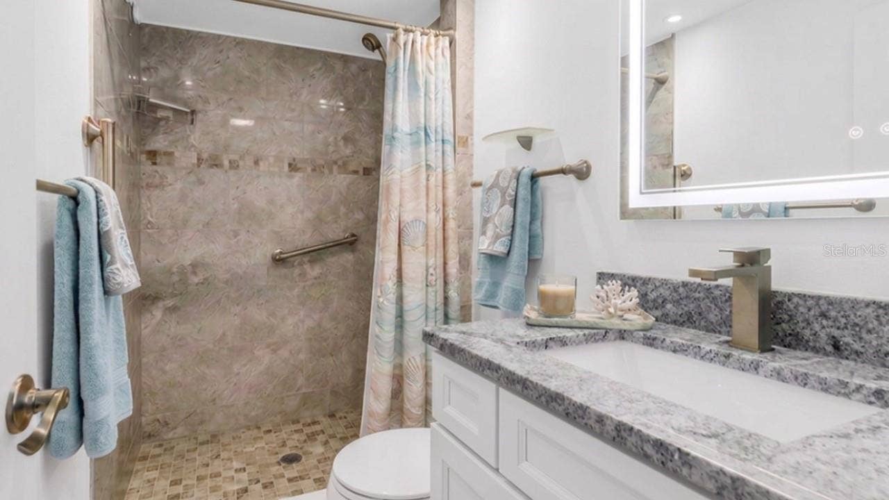 4455 DUHME ROAD, #109, St Petersburg, FL 33708 vVrtual staged guest bathroom