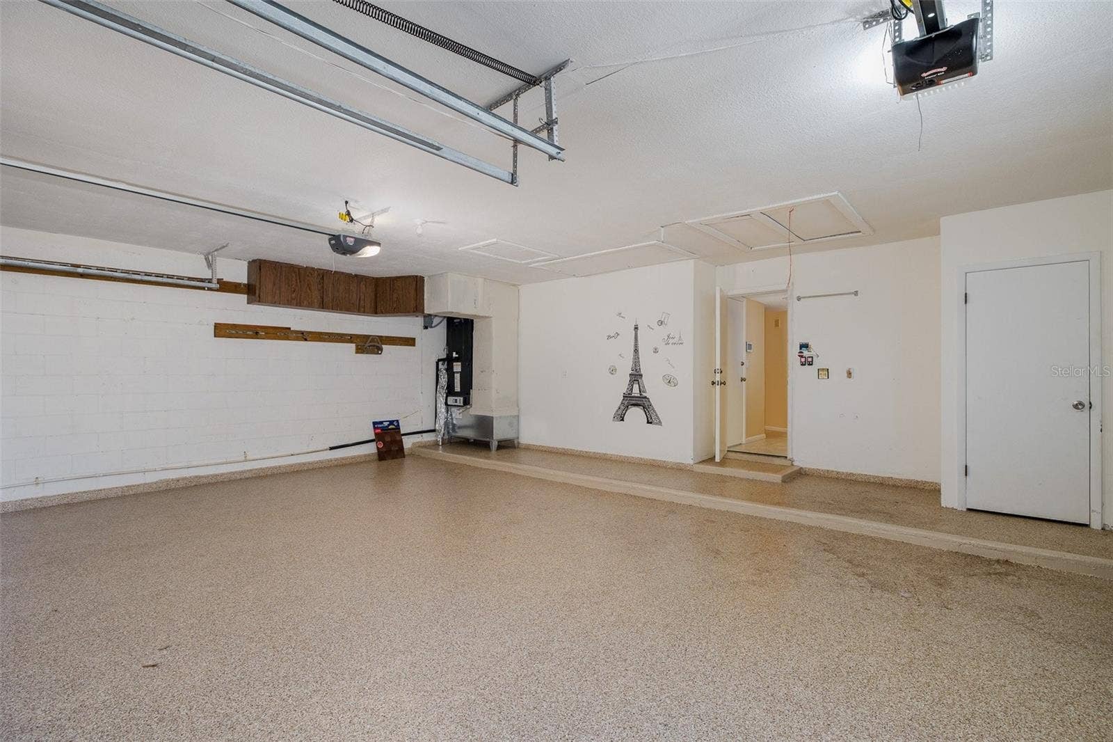 Oversized 3 car Garage with Acrylic Flooring