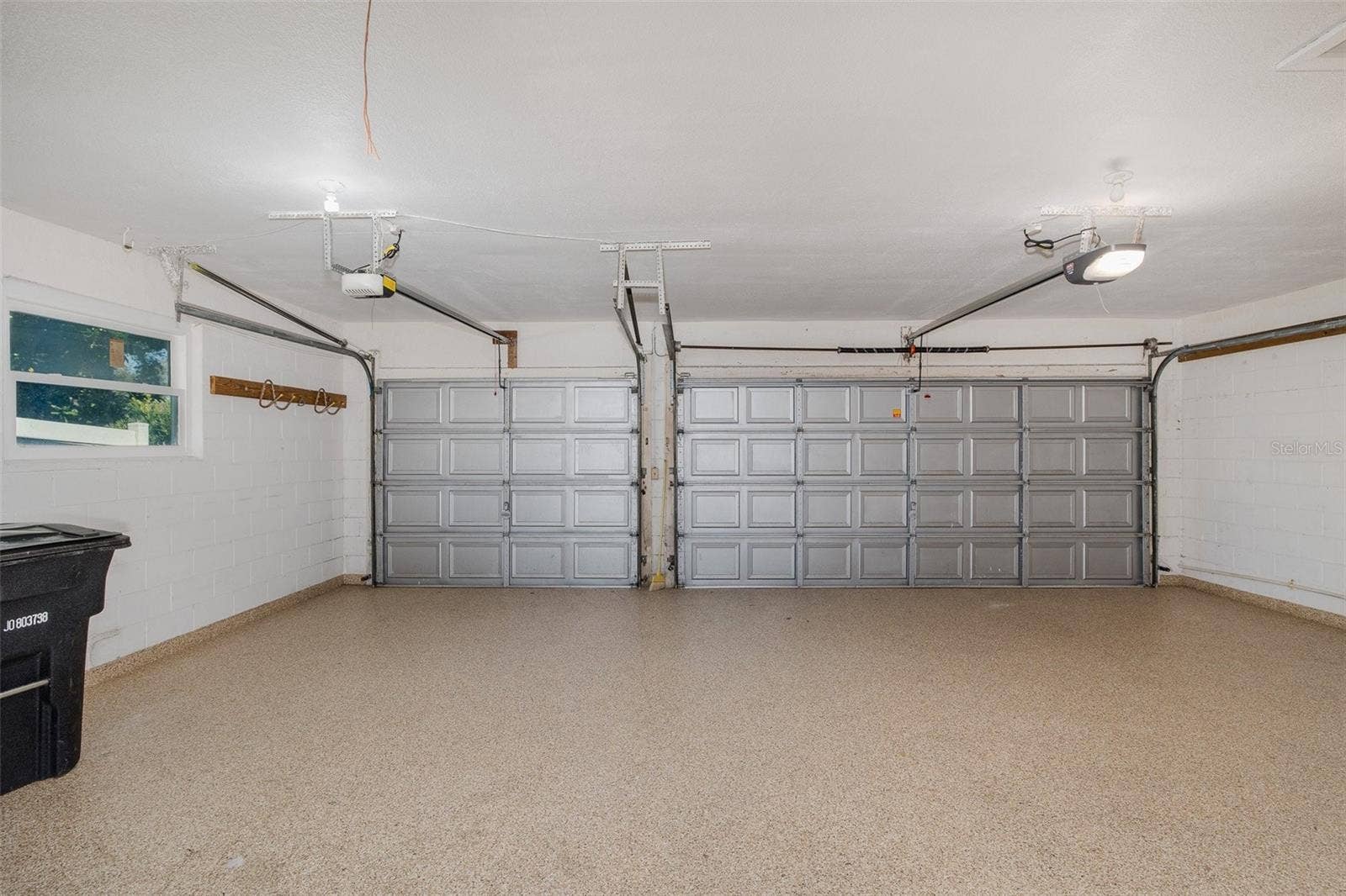 Oversized 3 car Garage with Acrylic Flooring