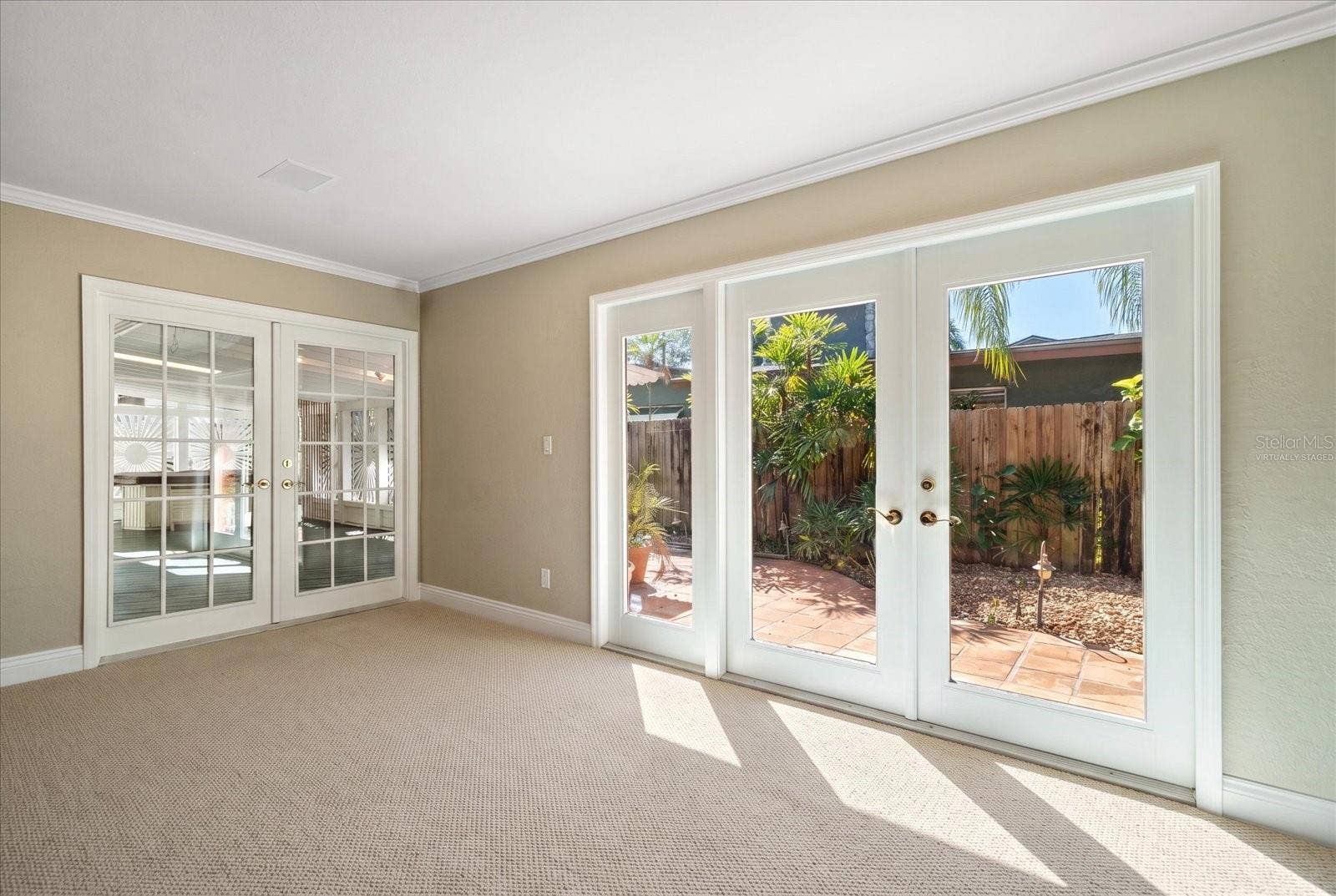 3033 82ND WAY N, St Petersburg, FL 33710 Living room - Virtually Staged with Carpet