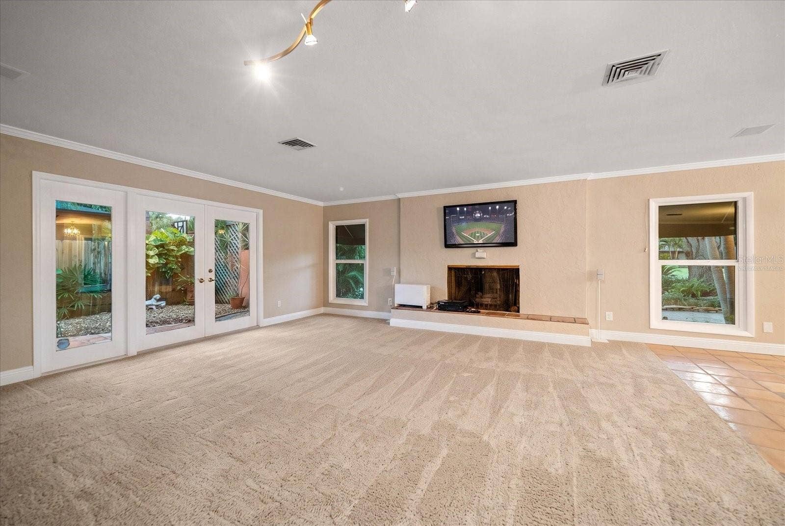 3033 82ND WAY N, St Petersburg, FL 33710 Living Room - Virtually Staged with Carpet