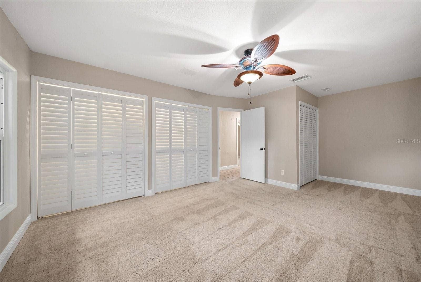 3033 82ND WAY N, St Petersburg, FL 33710 Primary Bedroom - Virtually Stage with Carpet