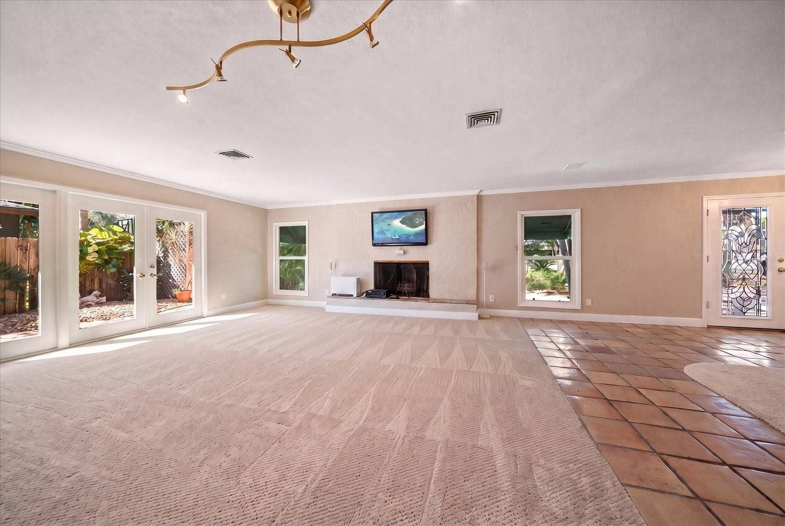 3033 82ND WAY N, St Petersburg, FL 33710 Living Room - Virtually Staged with carpet