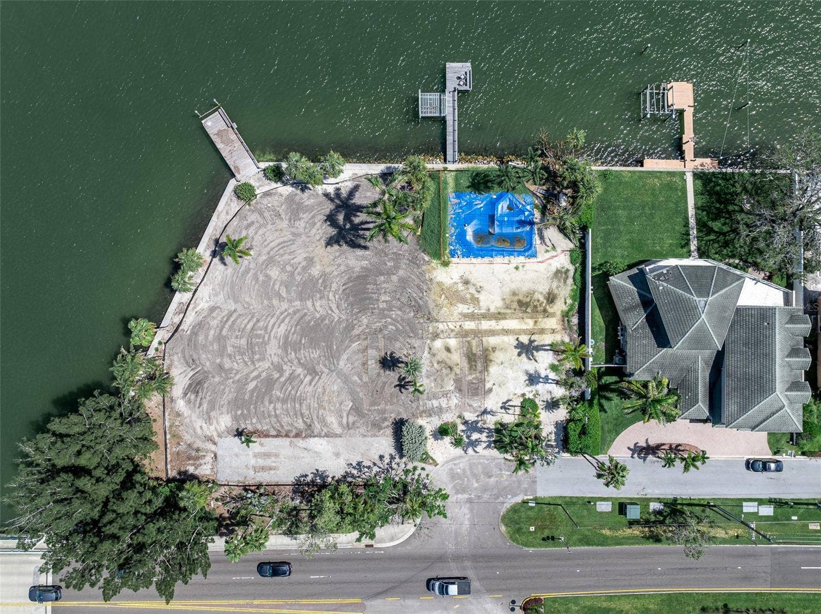 1 PARADISE LANE, Treasure Island, FL 33706 Existing Foliage adds Privacy From Road