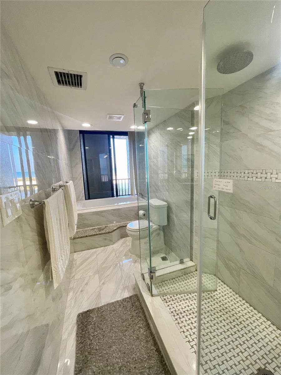 1290 GULF BOULEVARD, #302, Clearwater, FL 33767 Stand up shower and a soaker tub