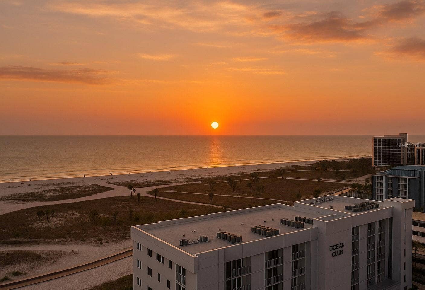 11500 GULF BOULEVARD, #504, Treasure Island, FL 33706 Building exterior and beach view
