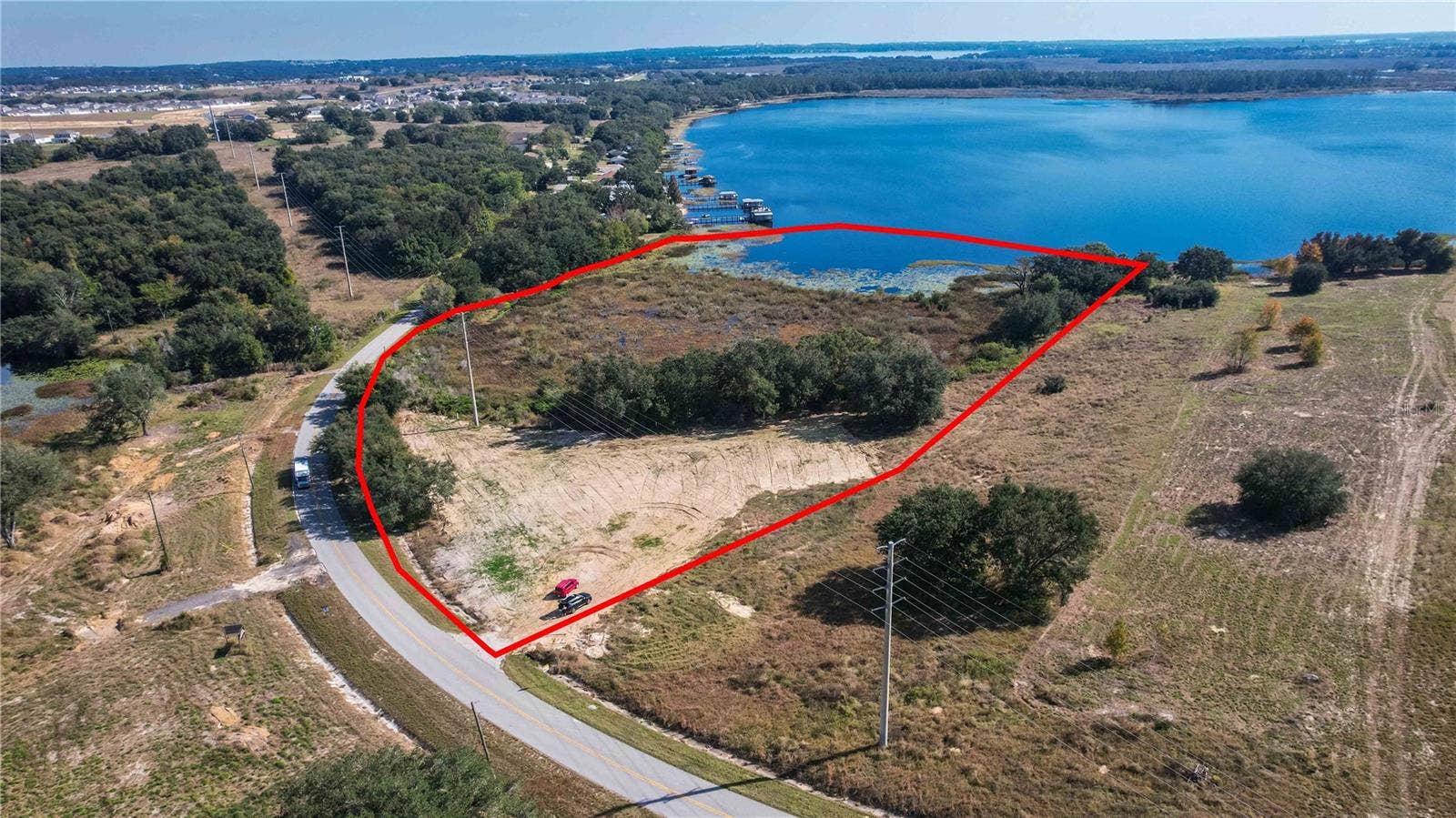 0 CHERRY LAKE ROAD, Groveland, FL 34736 Disclaimer: Lot boundary lines shown in this image are approximate and provided for illustrative purposes only. They do not represent a certified survey. Buyers should verify exact lot dimensions, boundaries, and acreage through official county records or a licensed surveyor.