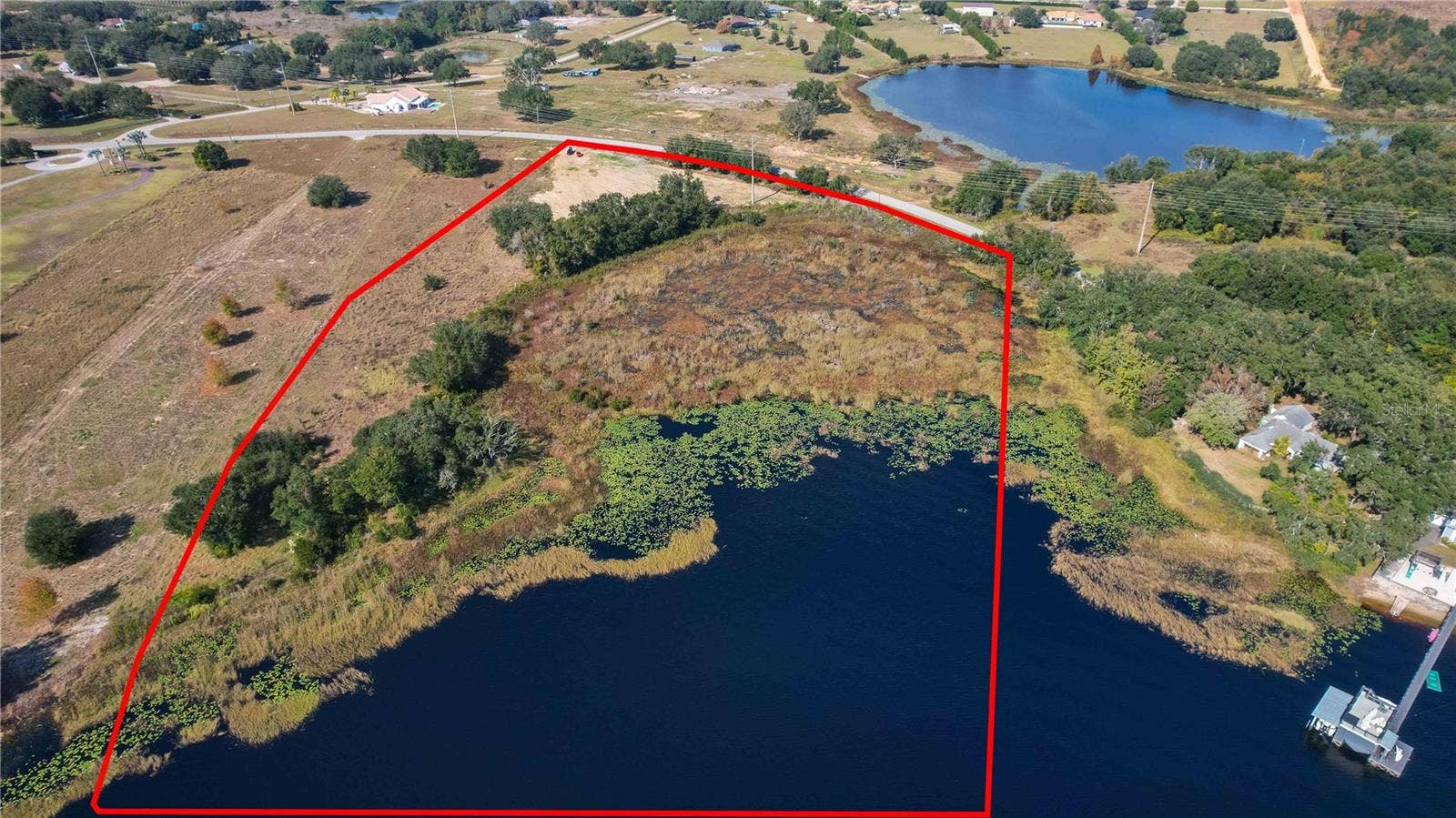 0 CHERRY LAKE ROAD, Groveland, FL 34736 Disclaimer: Lot boundary lines shown in this image are approximate and provided for illustrative purposes only. They do not represent a certified survey. Buyers should verify exact lot dimensions, boundaries, and acreage through official county records or a licensed surveyor.
