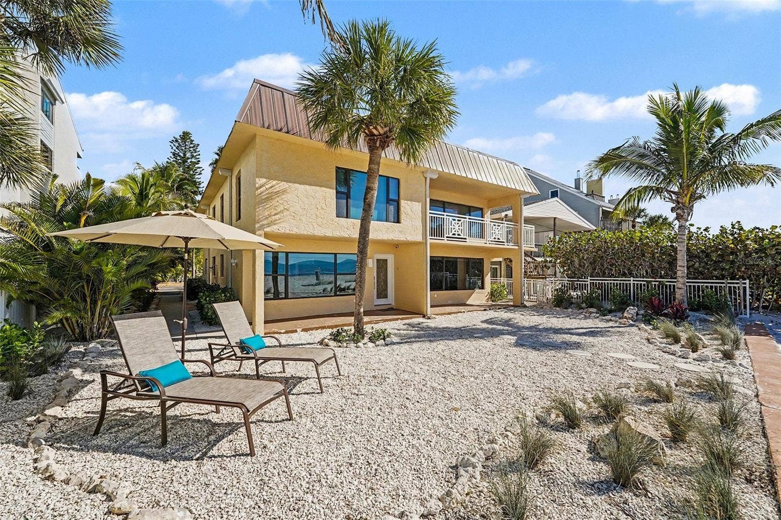 19936 GULF BOULEVARD, Indian Shores, FL 33785 The property is configured as two full, condo-style living spaces with a total of five bedrooms and four baths and separate entrances.