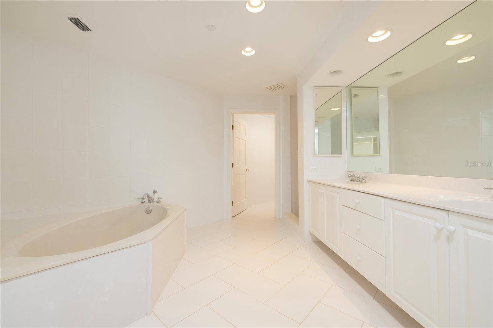 2 SEASIDE LANE, #103, Belleair, FL 33756 Master Bathroom with soaking tub, separate shower, dual vanities and separate water closet