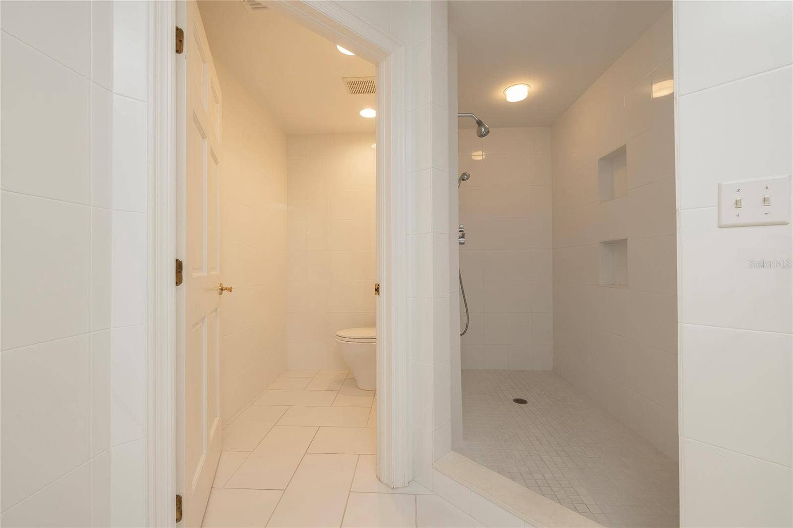 2 SEASIDE LANE, #103, Belleair, FL 33756 Master Bathroom with soaking tub, separate shower, dual vanities and separate water closet