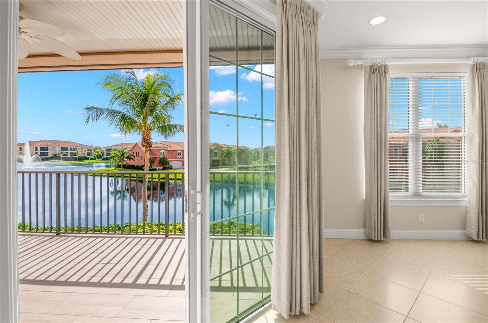 8 ACADEMY WAY S, #123, St Petersburg, FL 33711 Living Room access to Covered Terrace.