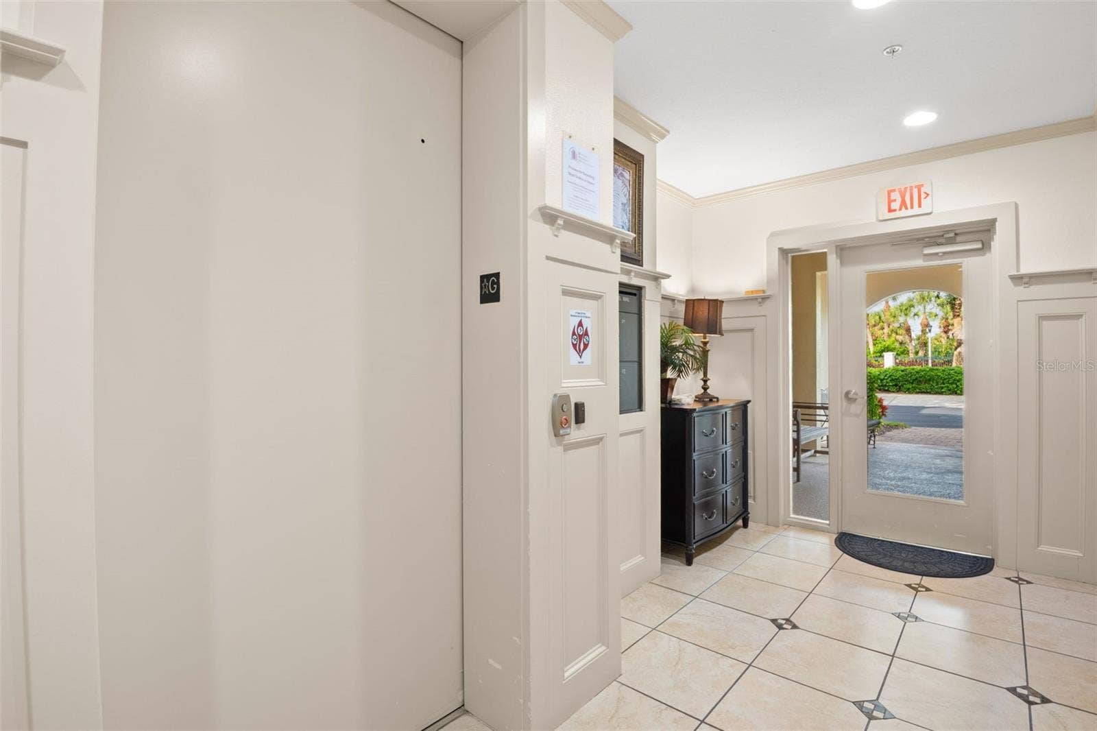 8 ACADEMY WAY S, #123, St Petersburg, FL 33711 Entering into the building lobby with access to the elevator.