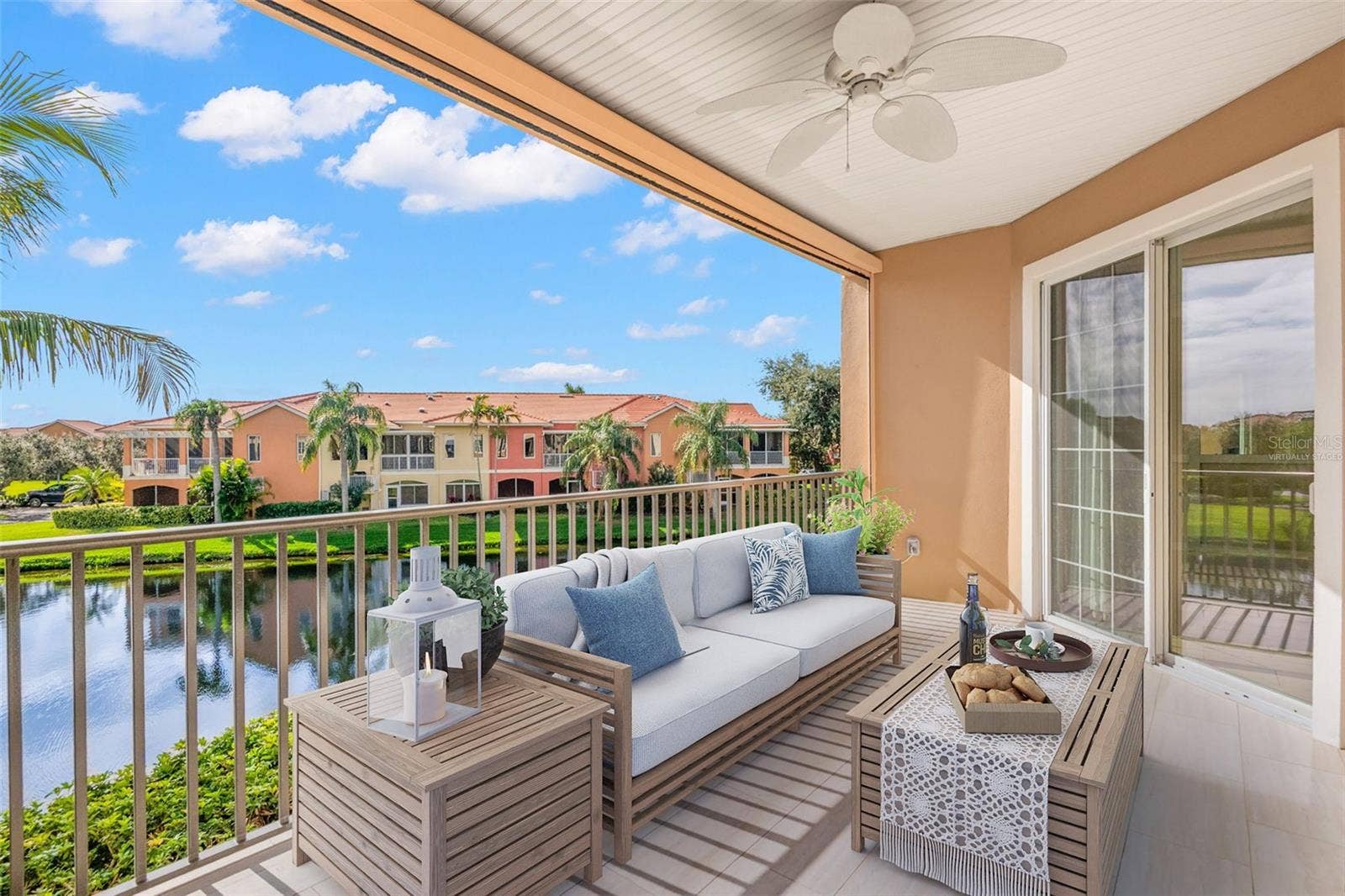8 ACADEMY WAY S, #123, St Petersburg, FL 33711 Virtually staged; partial view of large, Covered Terrace (19'x10')
