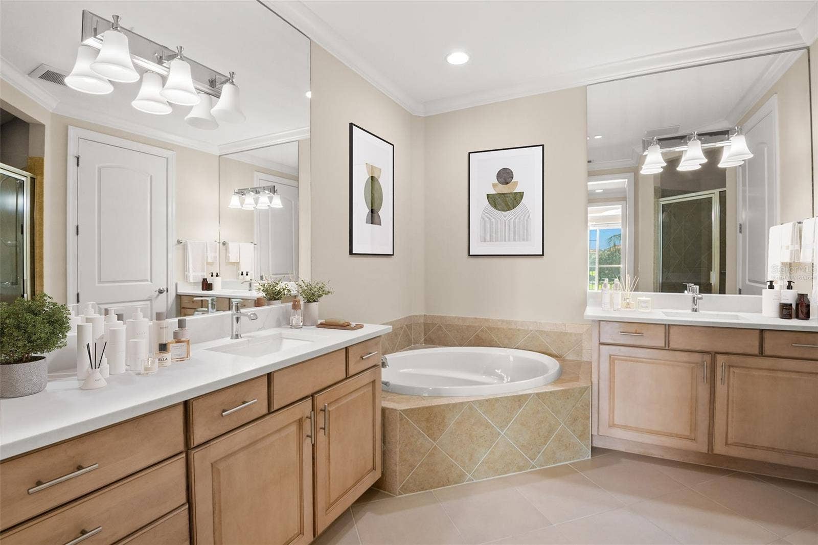 8 ACADEMY WAY S, #123, St Petersburg, FL 33711 Virtually staged; Oversized, dual vanities, and large tub in Owner's Bath.