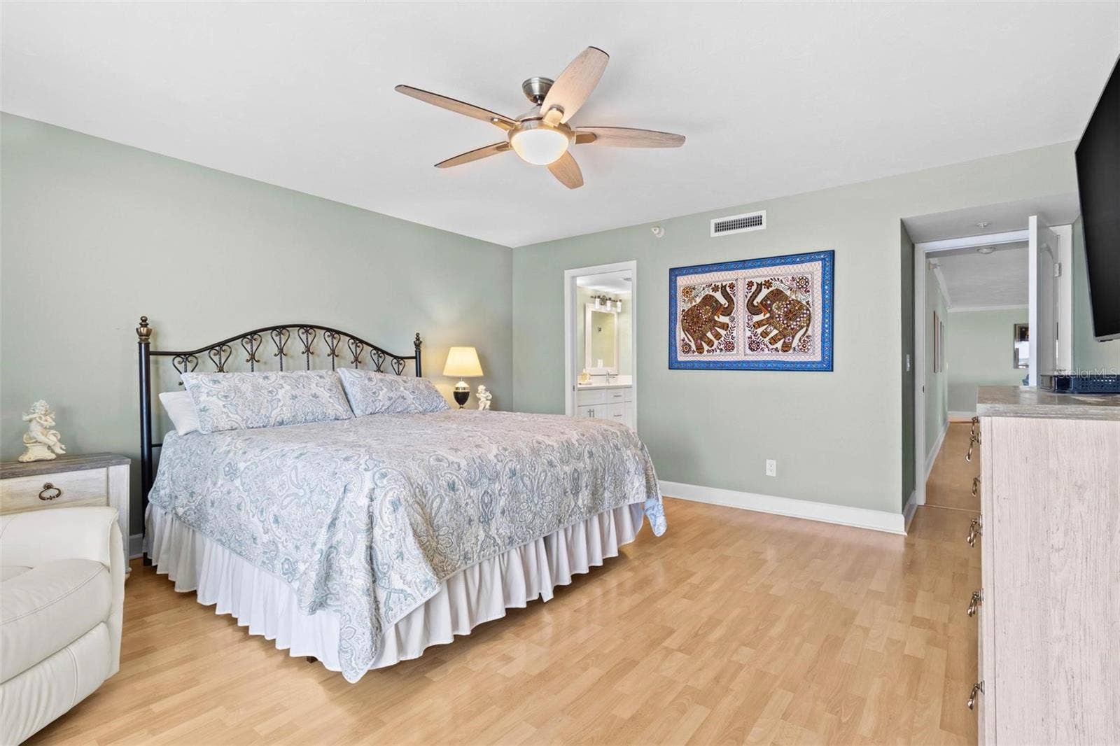 1660 GULF BOULEVARD, #607, Clearwater Beach, FL 33767 primary bedroom with bathroom en suite, water view and balcony