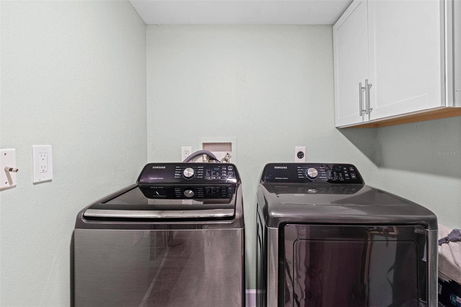 1660 GULF BOULEVARD, #607, Clearwater Beach, FL 33767 laundry room within unit