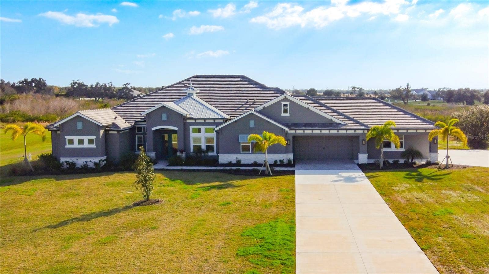 3586 RECURVE CIRCLE, Sarasota, FL 34240 Welcome to your estate home in Hampton Lakes.