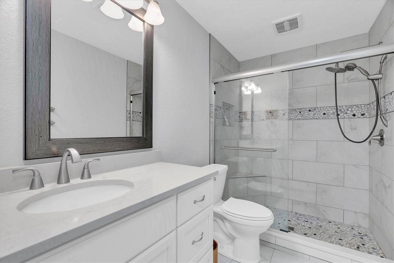 4935 62ND AVENUE S, St Petersburg, FL 33715 Downstairs hall full bath