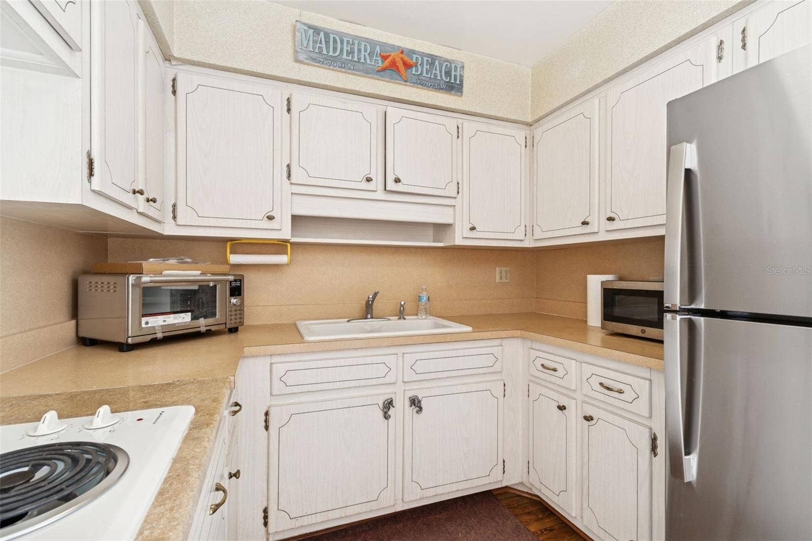 4565 DUHME ROAD, #203, St Petersburg, FL 33708 New Wave Oven on counter