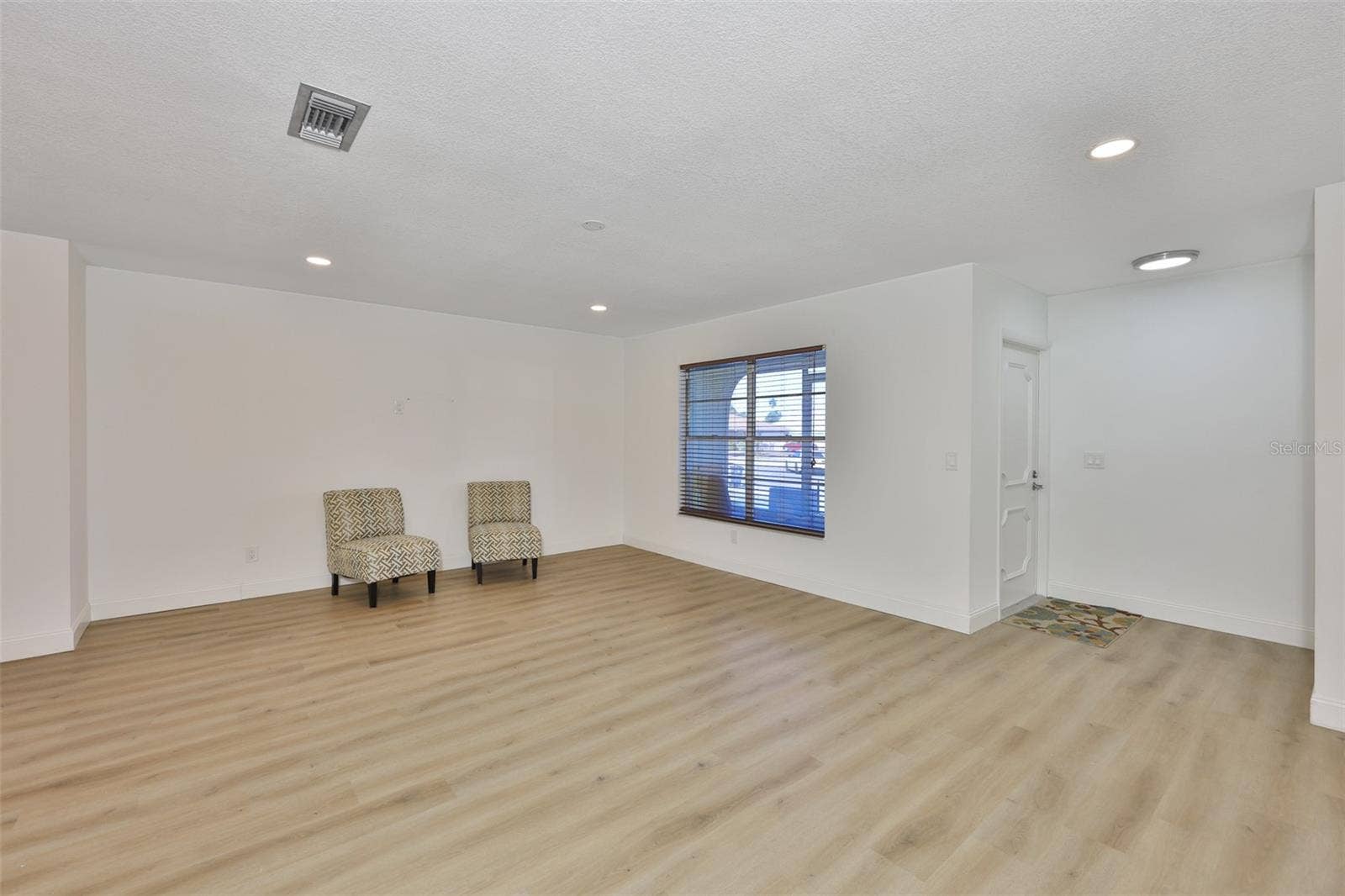 325 GREEN MANOR DRIVE, Sun City Center, FL 33573 Large living room with plenty of ways to decorate