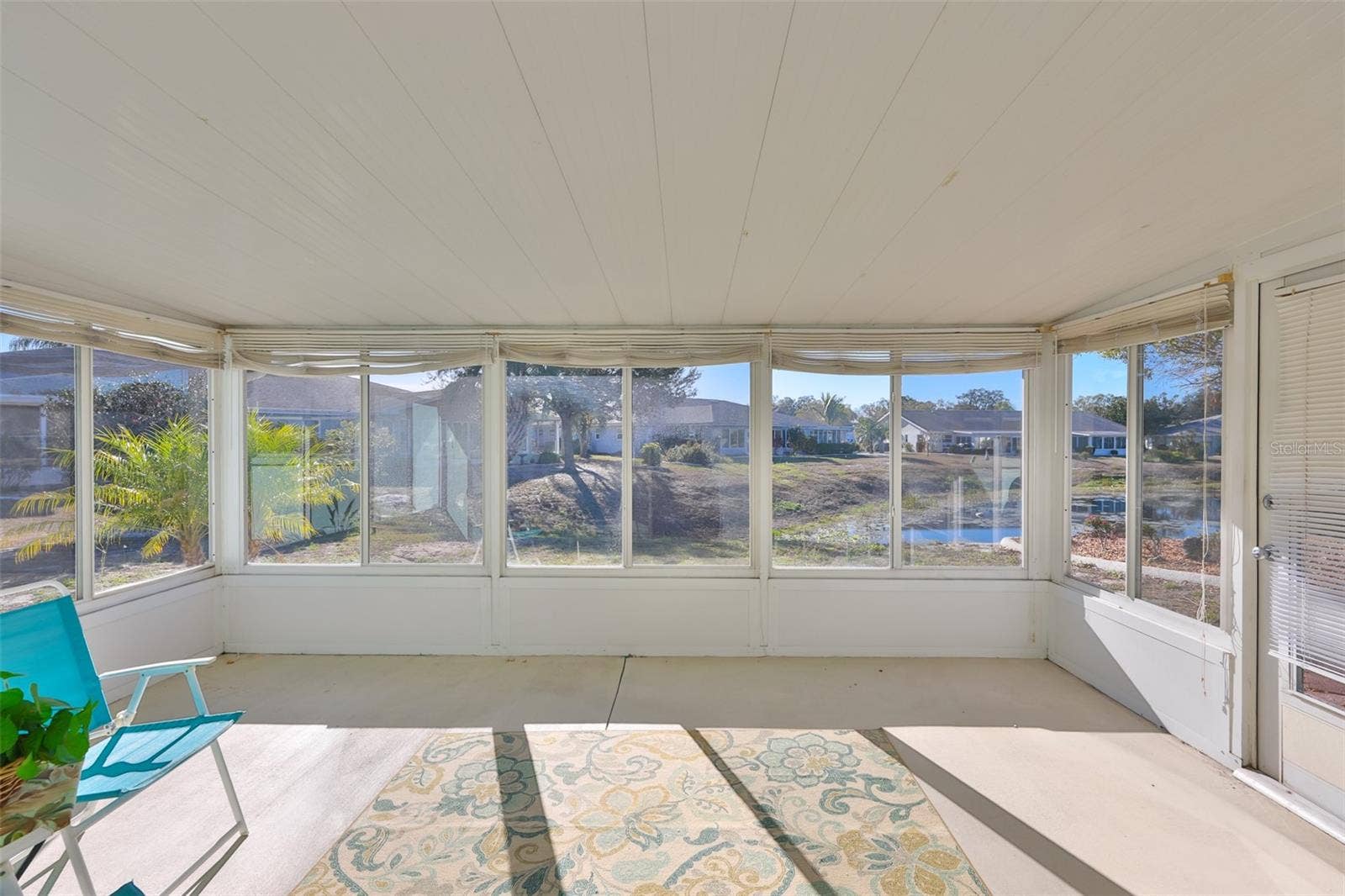 325 GREEN MANOR DRIVE, Sun City Center, FL 33573 Lanai with windows and screens-use all year!