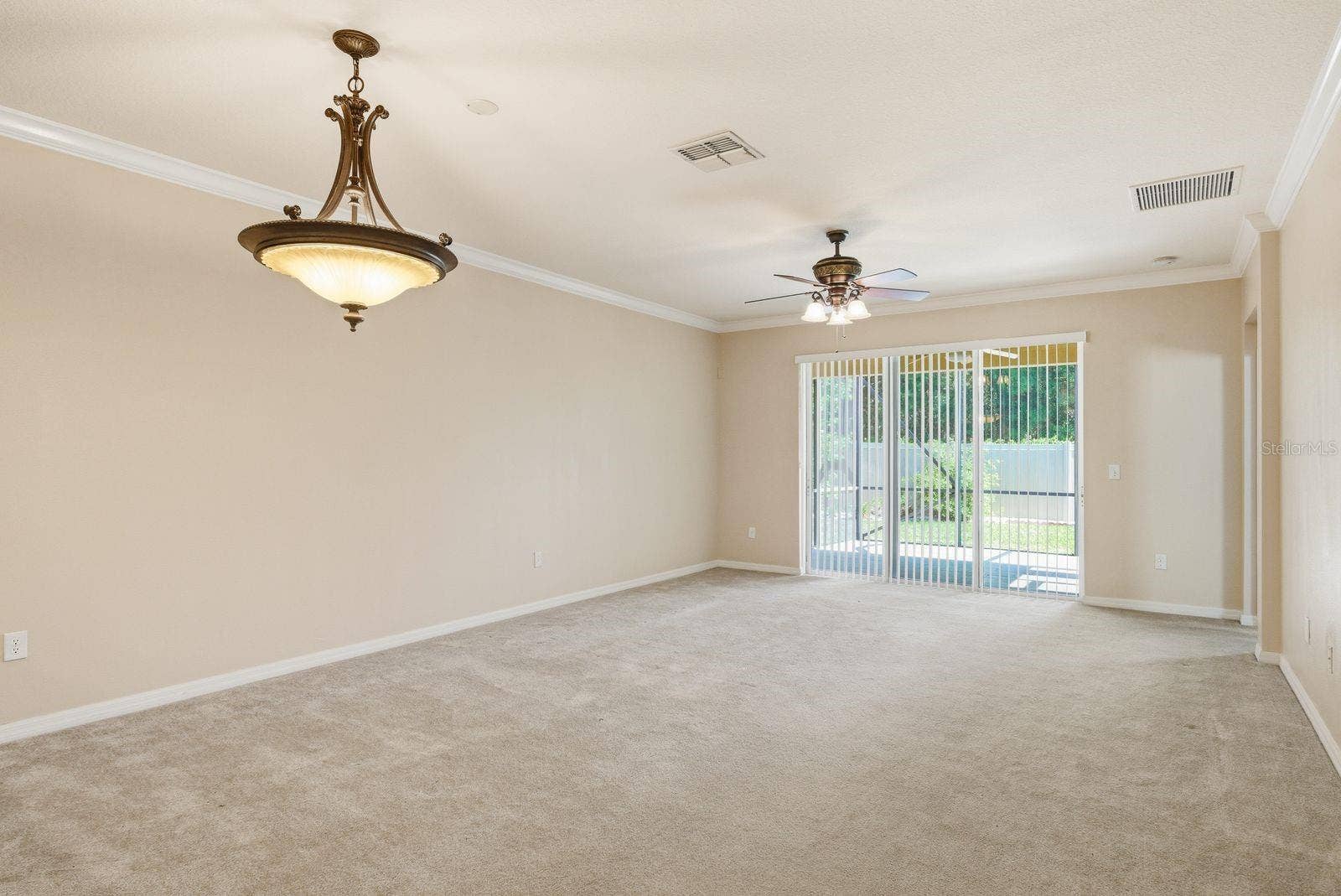 2302 BARRACUDA COURT, Holiday, FL 34691 Dining + Living Area