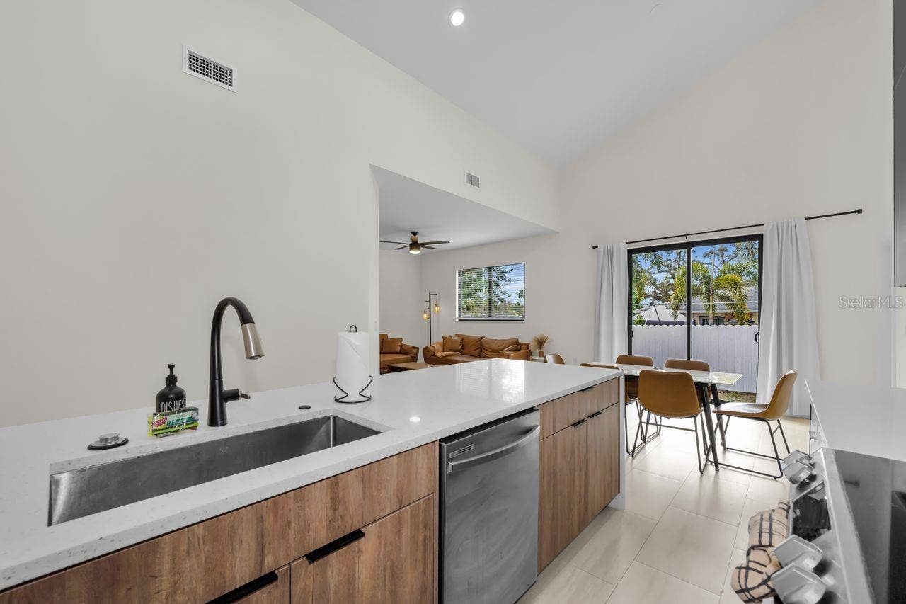 1590 S WASHINGTON AVENUE, Clearwater, FL 33756 Stay close to family and friends with this open concept home.