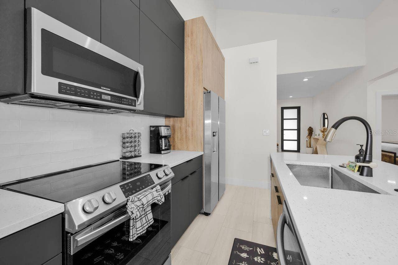 1590 S WASHINGTON AVENUE, Clearwater, FL 33756 Sleek stainless steel appliances
