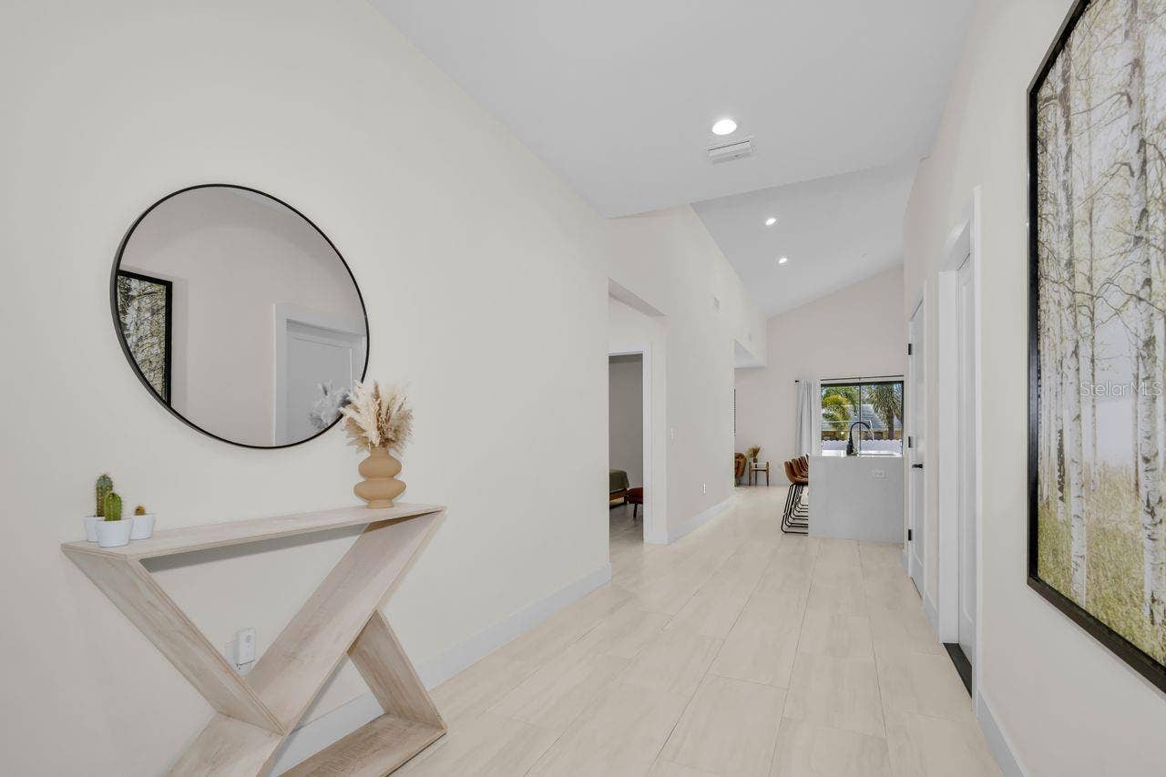 1590 S WASHINGTON AVENUE, Clearwater, FL 33756 Looking towards the kitchen and main living area.