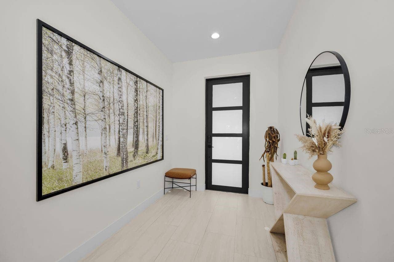 1590 S WASHINGTON AVENUE, Clearwater, FL 33756 Well lit and modern entry, so spacious!
