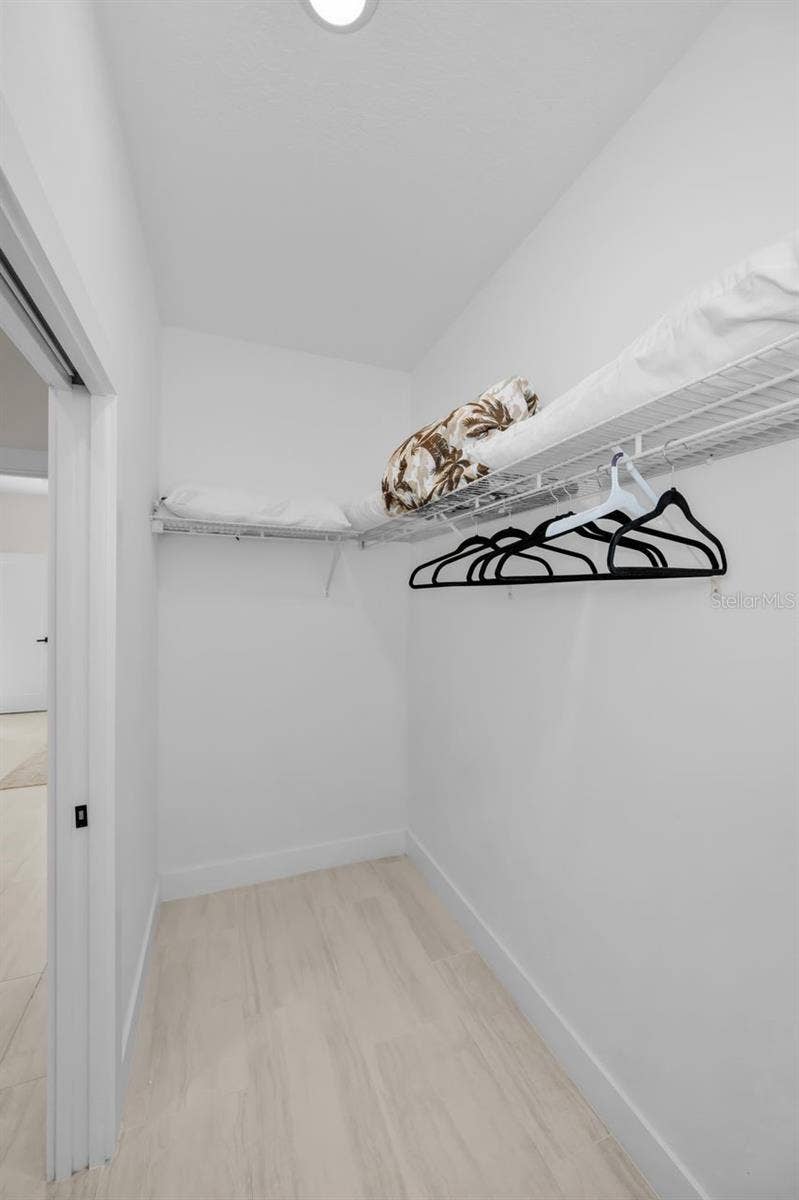 1590 S WASHINGTON AVENUE, Clearwater, FL 33756 Walk-in primary closet