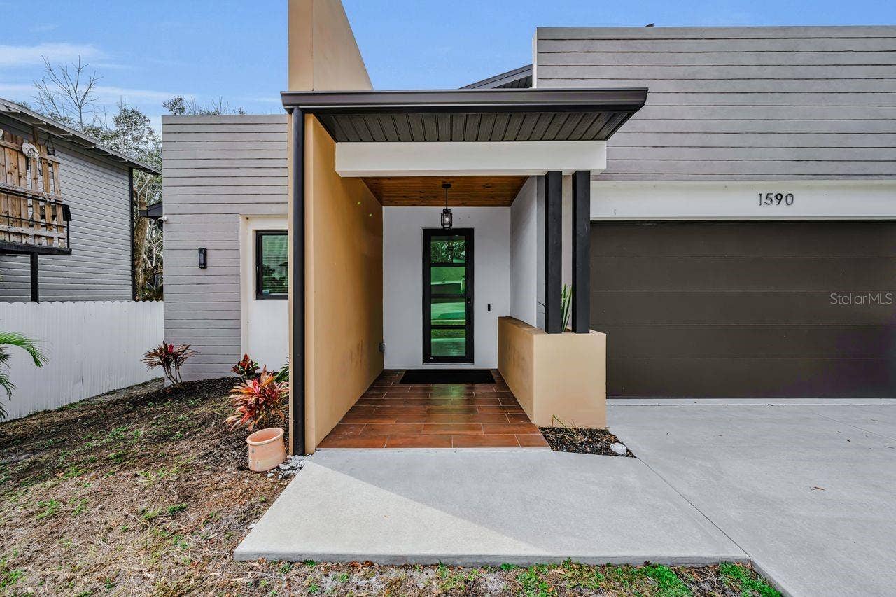 1590 S WASHINGTON AVENUE, Clearwater, FL 33756 A beautiful and stylish space to welcome family and friends!