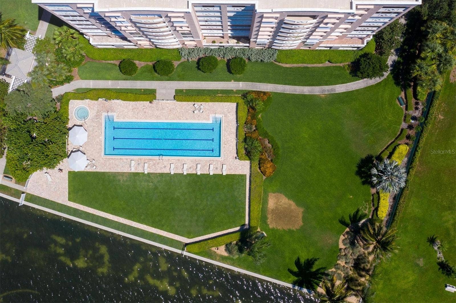 4993 BACOPA LANE S, #705, St Petersburg, FL 33715 Aerial view of community pool