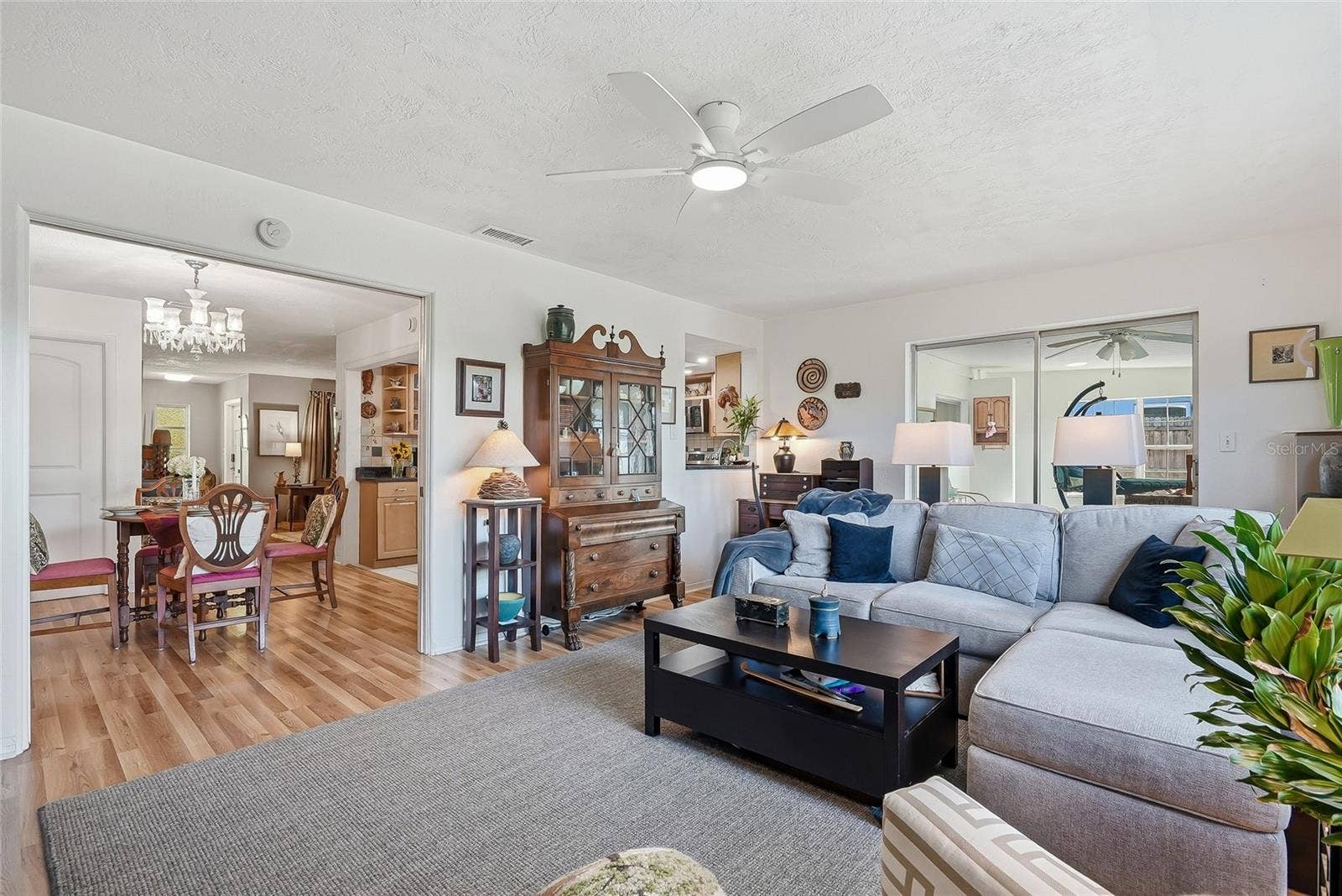 1890 62ND AVENUE S, St Petersburg, FL 33712 Space to spread out and stay connected, with the family room opening to the dining area and enclosed Florida room.