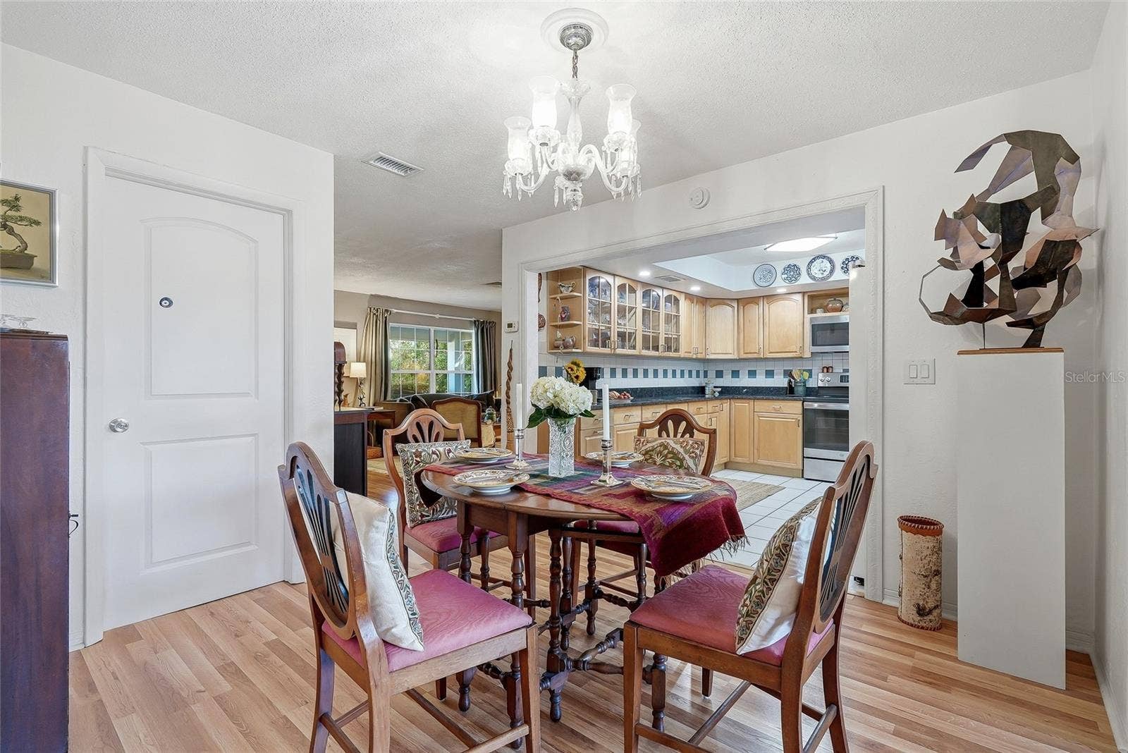 1890 62ND AVENUE S, St Petersburg, FL 33712 From everyday meals to special occasions, the dedicated dining area offers an inviting place to gather beside the family room.