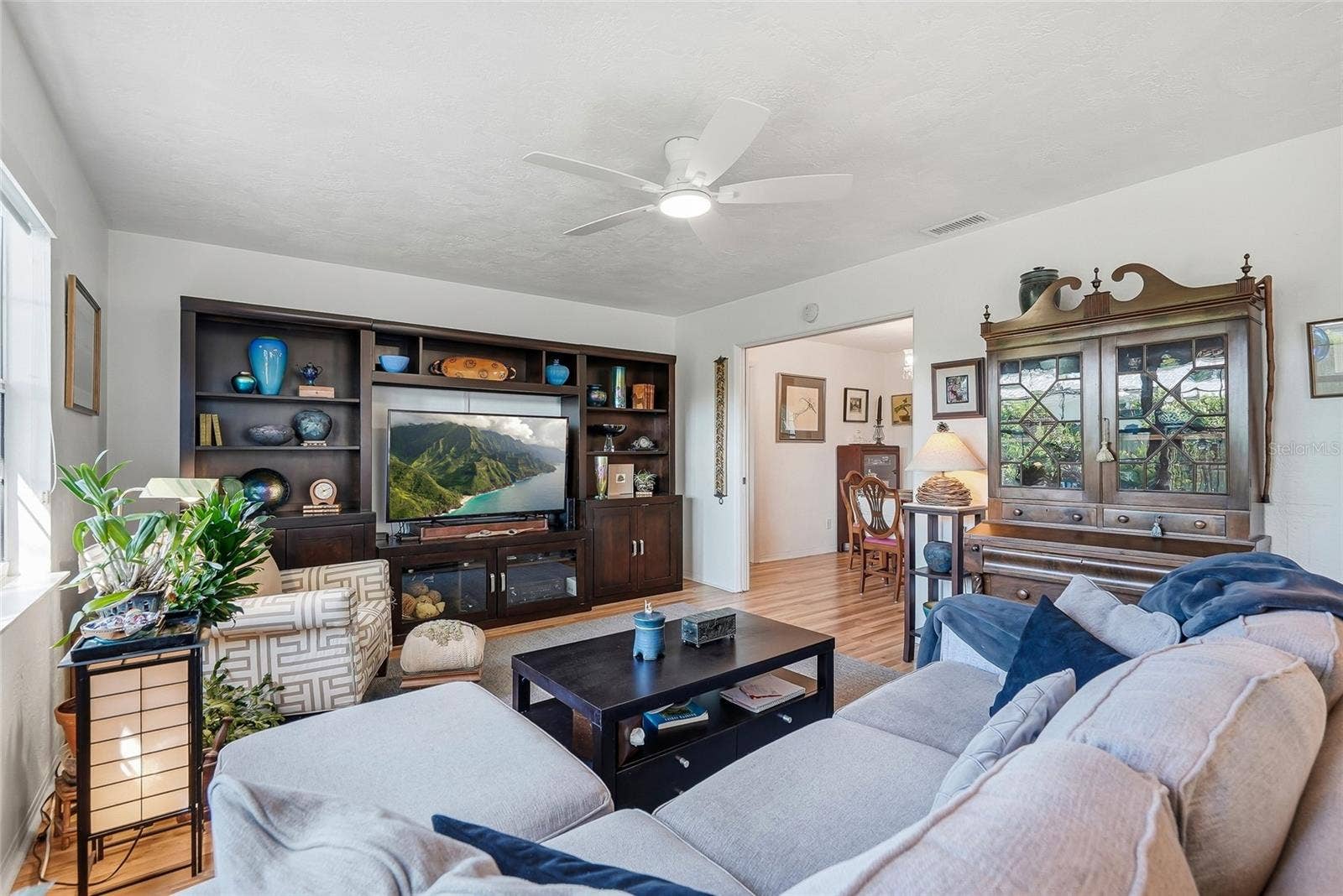 1890 62ND AVENUE S, St Petersburg, FL 33712 Picture movie nights or a quiet evening at home in this inviting family room, with generous space for comfortable seating and your entertainment setup.